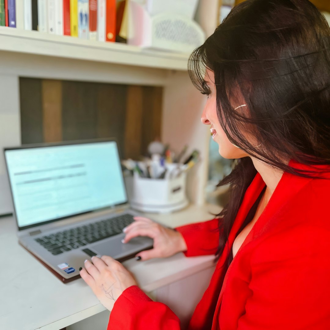 Professional Belgian woman technology analyst smiling